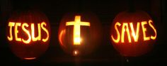 two carved pumpkins with the words jesus and saves carved into them