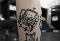 a black and white drawing of a toaster on someone's leg with hearts