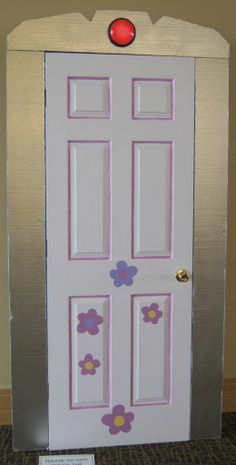 a white door with flowers painted on it