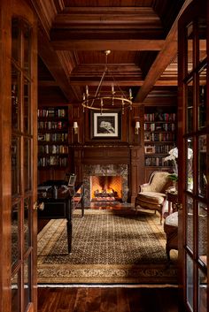 a living room filled with furniture and a fire place