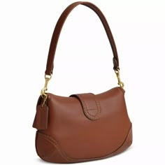 An instant icon by COACH, the Soho bag is a flap-front silhouette with a removable shoulder strap..Small sized bag; 10-1/2'W x 6-1/4'H x 2-3/4'D (width is measured across the bottom of handbag).Silhouette is based off 5'9' model.7-1/4' L removable handle.Magnetic snap closure.Interior zip pocket.Fabric lining.Leather.Spot clean.Imported Bag Business, Bag Inspiration, Free Bag, Vintage Engagement Rings, Women's Bags, Shoulder Bag Women, Bags Shoes, Coach Bags, Leather Shoulder Bag