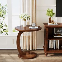 a living room scene with focus on the end table and bookshelf next to the window