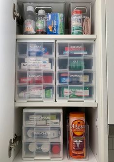 an organized pantry with plastic containers and other items in the cabinet door drawer, all labeled with labels