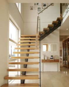 the stairs are made of wood and metal