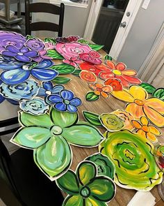 a table with flowers painted on it