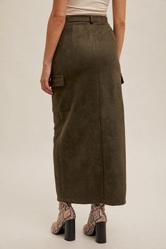 Olive Suede Front Slit Midi Length Cargo Runs True to Size 90% Polyester / 10% Spandex Small fits size 0/4; Medium fits size 6/8 Large fits size 10/12 Hand Wash Cold Line Dry Free Exchanges or Returns Holly 5'7'' | Bra 34B | Waist 28 | Wearing Size Small Suede Midi Skirt, Cargo Midi Skirt, Belted Denim Dress, Fitted Tops, Trendy Outerwear, Weekly Outfits, Twill Jacket, Perfect Jeans, Effortless Elegance