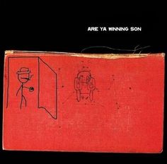 an old red book with a drawing of a man looking in a mirror and the words are ya winning son on it