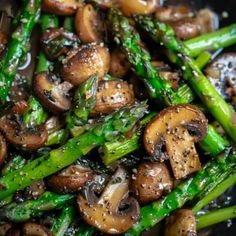 mushrooms and asparagus stir fry in a wok