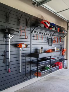 a garage with tools hanging on the wall