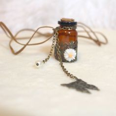 Vintage Sweet Wishing Keepsake Bottle Necklace Leather Necklace 31" Long Glass Dangling Charm Bottle Necklace Brown Suede Necklace 31" Long Totally Unique And One Of A Kind! #Glassbottle #Keepsake #Charms #Bottlenecklace #Brownsuede Brown Vintage Charm Jewelry As Gift, Vintage Brown Necklace For Gift, Vintage Brown Necklace For Gifts, Cute Handmade Brown Jewelry, Spooky Soiree, Pouch Necklace, Suede Necklace, Thick Necklace, Bottle Wrapping