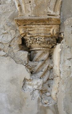 an old building that has been gutted with cement