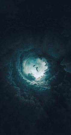 a bird flying in the middle of a dark cloud filled sky with light coming from it