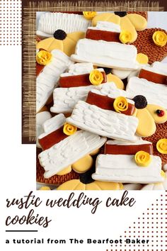 wedding cake cookies are arranged on a table with yellow flowers in the center and white icing