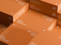 many brown boxes are stacked on top of each other with the words box mockup printed on them