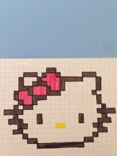 a drawing of a hello kitty on top of a piece of paper