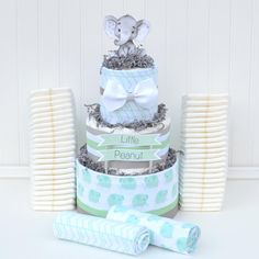 a baby shower cake with an elephant on top