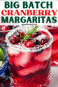 the cranberry margarita is garnished with fresh cherries and rosemary