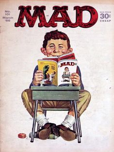 an old magazine cover with a boy sitting at a desk reading a book and the words mad on it