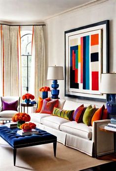 a living room filled with lots of furniture and colorful pillows on top of the couch