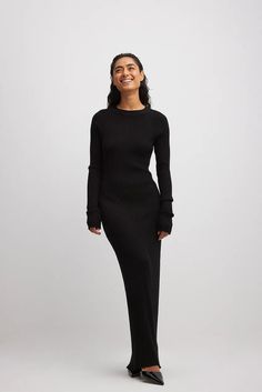 Knitted Ribbed Maxi Dress Black | NA-KD Black Ribbed Long Maxi Dress, Sleek Ribbed Dress For Fall, Sleek Ribbed Fall Dress, Black Ribbed Long Sleeve Maxi Dress, Ribbed Long Maxi Dress For Fall, Winter Ribbed Maxi Dress, Black Ribbed Midi Length Maxi Dress, Black Ribbed Maxi Dress, Preg Outfits