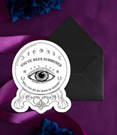 an envelope with a sticker that says you've been summoned by the all seeing eye