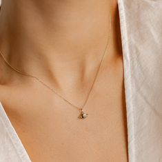 This Saturn pendant necklace is a modern and unique design that symbolizes growth and stability. It is made from 9 karat 375 solid gold featuring a celestial ringed orb, set with a tiny zirconia which gives it an elegant look. The pendant hangs from a delicate chain that has a lobster clasp closure. This pendant is the perfect choice for anyone looking for a simple, yet eye-catching look. It can also be sold as a single pendant without the chain!  💝 Ready for gifting: Beautifully packed in a je Saturn Planet Pendant, Saturn Charm, Saturn Pendant, Planet Pendant, Saturn Necklace, Real Gold Chains, Handmade Fine Jewelry, Solid Gold Chains, Neck Chain