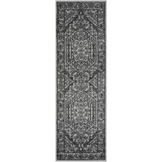 a black and white runner rug on a white background