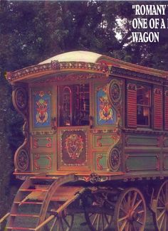 an old fashioned wagon is painted green and red with ornate designs on the side, along with words that read'roman one of a wagon '