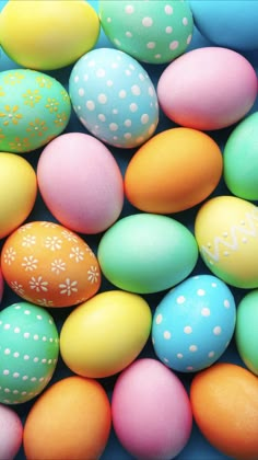 colorful easter eggs with white dots on them