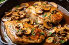 chicken with mushrooms and parsley in a skillet