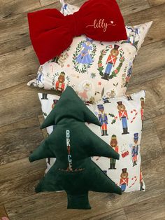 pillows with christmas decorations and bows on them