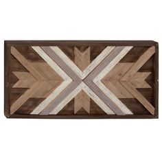 a wooden wall hanging with an arrow design on the front and back of it's frame