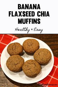 banana flaxseed chia muffins on a white plate with red checkered napkin