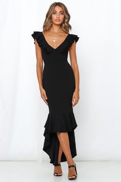 Length from shoulder to hem of size S: 118cm - 125cm. (Hi-low hemline) Black dress. Lined. Cold hand wash only. Model is a standard XS and is wearing XS. True to size. Stretchy mid-weight woven crepe fabric. Invisible back zipper. Polyester/spandex. Gurrrl make some drama in this show stopping number! The Hills Maxi Dress features a hi-low ruffle hem, invisible back zipper, tubular crossover detailing on the back and a feminine v-neckline. We love wearing ours with a smokey eye, bold clutch and Winter Semi Formal Dresses, Black Tie Wedding Guest Dress, Black Dresses Classy, Black Tie Wedding Guests, Black Ruffle Dress, Guest Attire, Semi Formal Dresses, Maxi Dress Black, Black Wedding Dresses