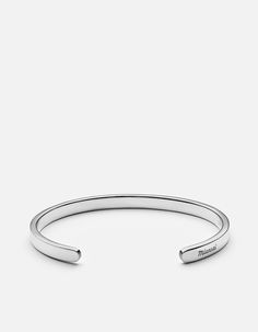 The minimal slip-on Singular Cuff for men, is a timeless classic that transcends seasons and looks good with any outfit. It’s slightly adjustable in size ranging from small to large and has a polished exterior and interior finish. Available for monogram personalization. Also available in matte silver, polished 14k gold, polished black, matte brass and matte silver/matte gold. All sales on personalized and custom items are final. Monograms are uppercase and limited to the 26 letters and numbers 0 Silver Kada For Men, Silver Bracelet Designs, Mens Cuff Bracelets, Mens Cuff, Wrist Jewelry, Mens Bracelet Silver, Silver Jewels, Bracelet Sterling Silver, Sterling Silver Mens