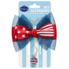 a red, white and blue bow tie with an american flag keychain attached to it