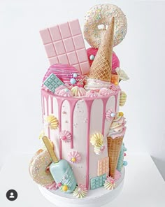 a cake decorated with ice cream and candy