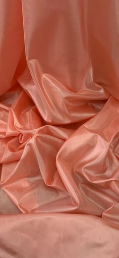 an image of a pink fabric that is very soft and drapy in color