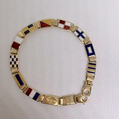 10000% Authentic 18k Solid Gold Bracelet. Approximately 13.5 Grams. Great Condition Exactly As Seen. 750 Stamped! Fine Quality Made. Wonderful Gift For That Special Someone! Exactly As Photos. Buy With Even More Confidence As This Item Is Poshmark Authenticator Protected Nautical Flags, Solid Gold Bracelet, Enamel Bracelet, Mens Accessories Jewelry, Gold Enamel, Nautical, Solid Gold, Gold Bracelet, Mens Accessories