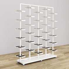 a white shelf with many shelves on it