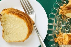 a piece of cake on a plate next to a fork