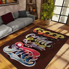 a living room with couches and a rug that has the words graffiti on it