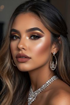 Get inspired by these prom makeup ideas tailored for different skin tones. Whether you have fair, medium, or dark skin, these makeup looks will make you stand out on your special night. #prommakeup #prom #fairskinmakeup #mediumskinmakeup #darkskinmakeup #differentskintonesmakeup #beautymakeup #beauty Sultry Bridal Makeup Brown Eyes, Elegant Makeup Looks For Prom, Golden Makeup Look Glam, Full Glam Makeup Looks Brown Eyes, Glam Makeup Looks Dramatic, Bronze Glam Makeup, Medium Skin Makeup, Makeup Ideas Glam, Gold Tone Makeup