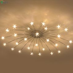 the ceiling light is decorated with white stars