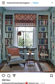 a living room filled with lots of bookshelves next to a table and chair