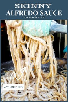 the recipe for skinnyy alfredo sauce is being stirred with a spatula over noodles