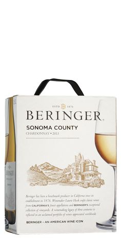 a bottle and glass of wine sitting in front of a white box with the words beringer on it