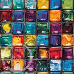 colorful glass tiles with different colors and shapes on them, all arranged in the same pattern