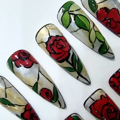 A mystical rose blooms on each nail in this enchanting press-on set. Rich red petals and green leaves evoke the beauty of floral stained glass. The elegant stiletto shape and artistic details lend an air of fantasy, perfect for adding some whimsical flair to your next event. 🌸Thank you for supporting my small business.🌸 You can reuse all the nails you purchased from us multiple times, if you handle them with care 📦𝐖𝐡𝐚𝐭 𝐜𝐨𝐦𝐞𝐬 𝐰𝐢𝐭𝐡 𝐲𝐨𝐮𝐫 𝐩𝐫𝐞𝐬𝐬 𝐨𝐧 𝐧𝐚𝐢𝐥 𝐤𝐢𝐭? 10 𝘯𝘢? Nails Gothic, Stained Glass Floral, Press On Nail Kit, Beauty Beast, Enchanted Rose, Rose Nails, Red Stain, Stained Glass Flowers, Glass Nails