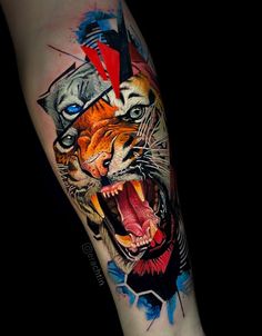 a man with a tattoo on his arm has a tiger and an arrow in it's head